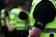 Woman charged with hate crime after Greenock protest over asylum hotel