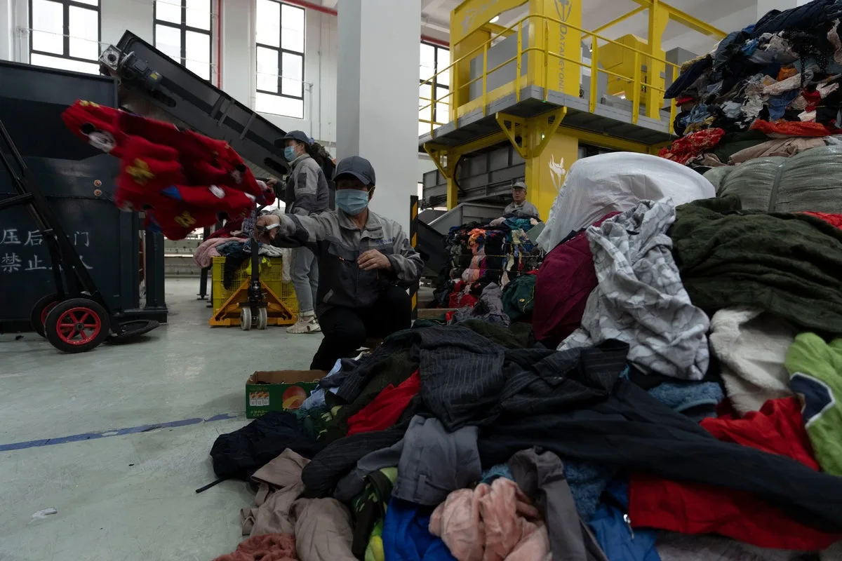 AI machine sorts clothes faster than humans to boost textile recycling in China