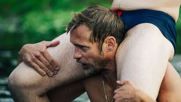 Alexander Skarsgård's Kinky BDSM Romcom 'Pillion' Divides Critics and Audiences