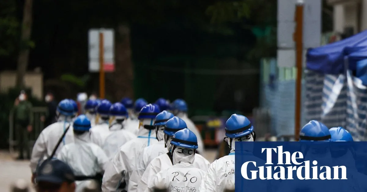 Beijing's Hong Kong Security Office Warns Foreign Journalists After Deadly Fire