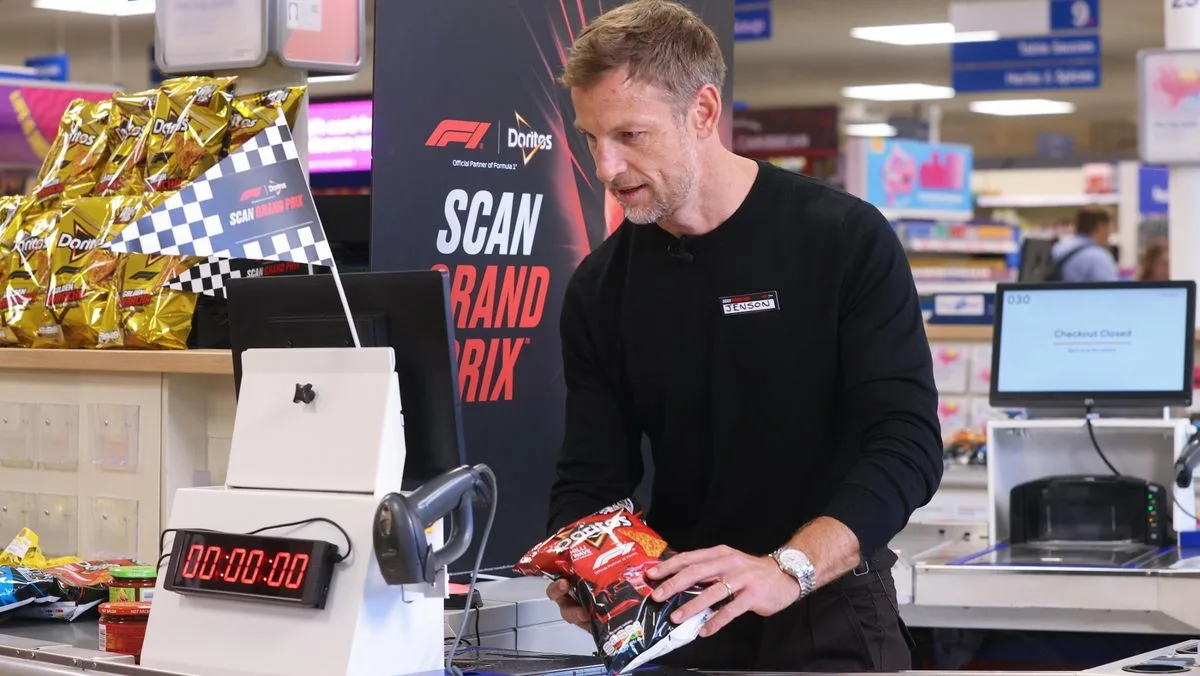 F1 Champ Button Loses To Cashier In Scanning Race