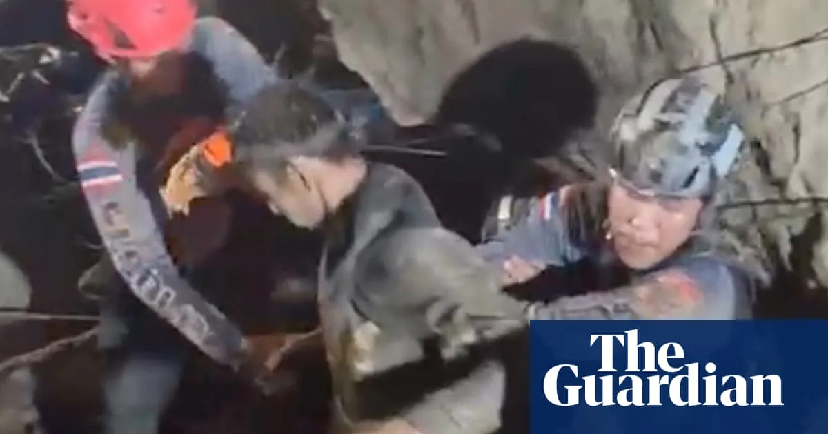 First man rescued from flooded Laos cave