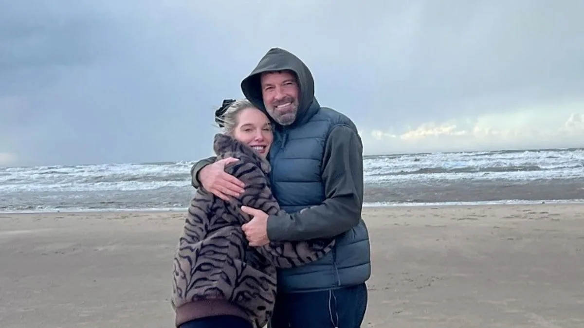 Helen Flanagan cuddles up to new man during family beach day