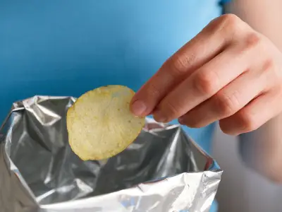 Binman Settles Debate: Where to Put Crisp and Chocolate Packets