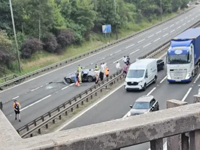 Car Crashes Through Bridge Barrier, Lands on M8 in Paisley, Two Injured