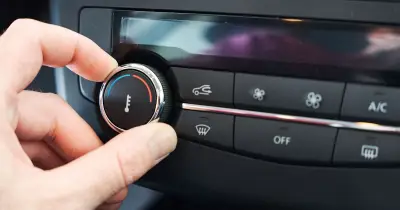 Drivers risk £110 fine for using air-con while stationary this summer