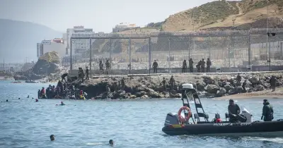 Fires and clashes as 3,000 migrants storm Spain-Morocco border