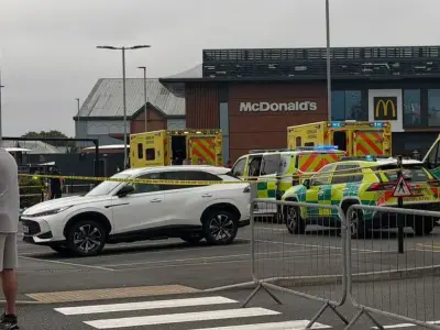 Major Emergency Response at Llandudno McDonald's: Police and Ambulances Swarm Retail Park
