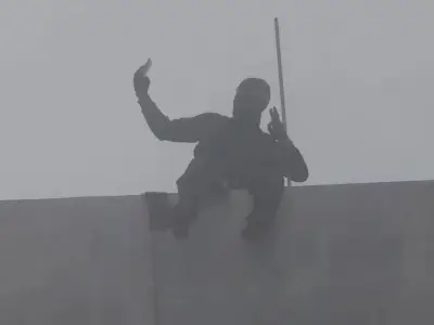 Masked Man Scales 460ft Bolte Bridge, Demands Taxes Cut and Sandwich