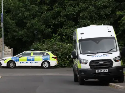 Murder Investigation After Pensioner Found Dead in Bolton Home