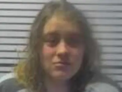 Naked Woman Arrested for Erratic Driving, Drugs and Guns Found