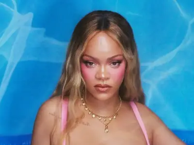 Rihanna Stuns in Plunging Pink Lace Bodysuit for Savage X Fenty Campaign