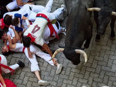 Runner Gored in Face During Chaotic Pamplona San Fermin Bull Run