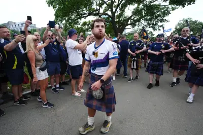 Tartan Army fan who raised £1m for charity in 3,000-mile US walk returns home
