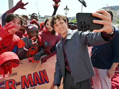 Tom Holland throws up during Hot Ones challenge, vows never again