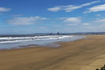 Two Men Die Rescuing Children from Sea Amid UK Heatwave