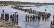 10,000 Protesters Form Human Chain to Save Majorca Beach from Tourism