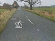 A696 closed near Otterburn after single-vehicle crash, police and paramedics on scene