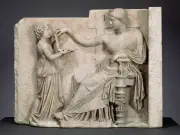 Ancient Greek Statue Sparks Time Travel Theories Over Object Resembling Laptop