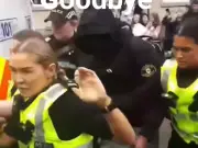 Angry Crowd in Glasgow as Men Escorted by Police from Flats