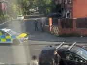 Armed Police and Helicopter Swoop on Bury Street, Three Arrested