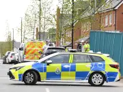 Armed police swarm Prescot estate after man attacked in van