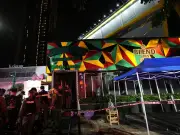 At least 27 dead in Bangkok pub fire as people flee blaze