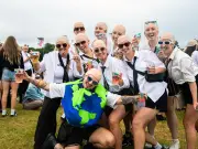 Bald Caps and Suits Take Over Cardiff for Pitbull Concert