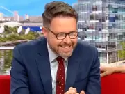 BBC Breakfast hosts laugh as swimmer interrupts live report