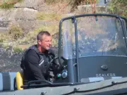 Bear Grylls collects Waitrose shopping from Welsh beach in amphibious boat