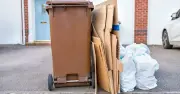 Binman settles debate on putting rubbish beside wheelie bin