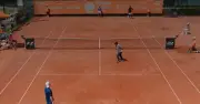 Bizarre Tennis Interruption: Worker Runs Across Court on Set Point