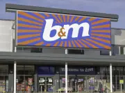 B&M's £8 Burgundy Confetti Scented Candle Adds 'Rich Warmth' to Rooms