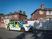 Boy, 16, arrested for murder of woman, 60s, in Manchester