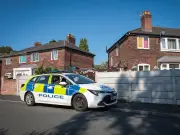 Boy, 16, arrested on suspicion of murder after woman, 60s, found dead