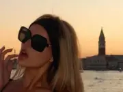 Brooks Nader Stuns in Plunging Black Dress in Venice Amid Baywatch Reboot