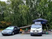 Campervan hogging four spaces at North Wales lake sparks local anger