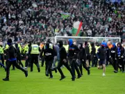Celtic slam masked Rangers ultras 'carrying weapons' and point finger at Police in response to SFA review