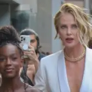 Charlize Theron's Rare Red Carpet Appearance with Daughters at The Odyssey Premiere