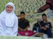 Couple Flogged 21 Times for Kissing on TikTok in Aceh, Indonesia
