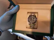 Dawn Raids in Wigan Seize Rolex and Knives in Courier Fraud Probe