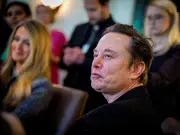 Elon Musk backs Restore Britain candidate after NHS suspension