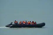 Fact Check: AI-Generated Video of Migrant with Machete Debunked