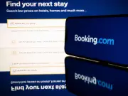 Family finds man behind wall at Booking.com rental property
