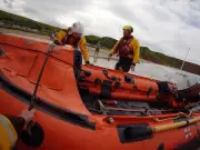Father and Son RNLI Volunteers Rescue Stranded Paddleboarder and Fisherman