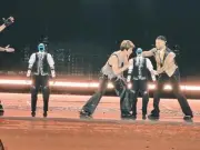 Glitching Robot Dancer Falls Over and Hits Popstar Wang Leehom on Stage