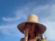 Heidi Klum Uses Crisp Bag as Bikini Top on Beach Holiday