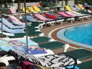 Hotel Sunbed Rules: Tourists Queue for Hour in 'Manic Race' for Prime Spots