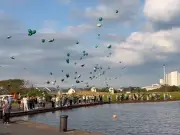 Hundreds gather for Kayden Moy memorial with green balloon release