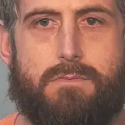 Indiana man charged with arson after cutting off genitals to start fire